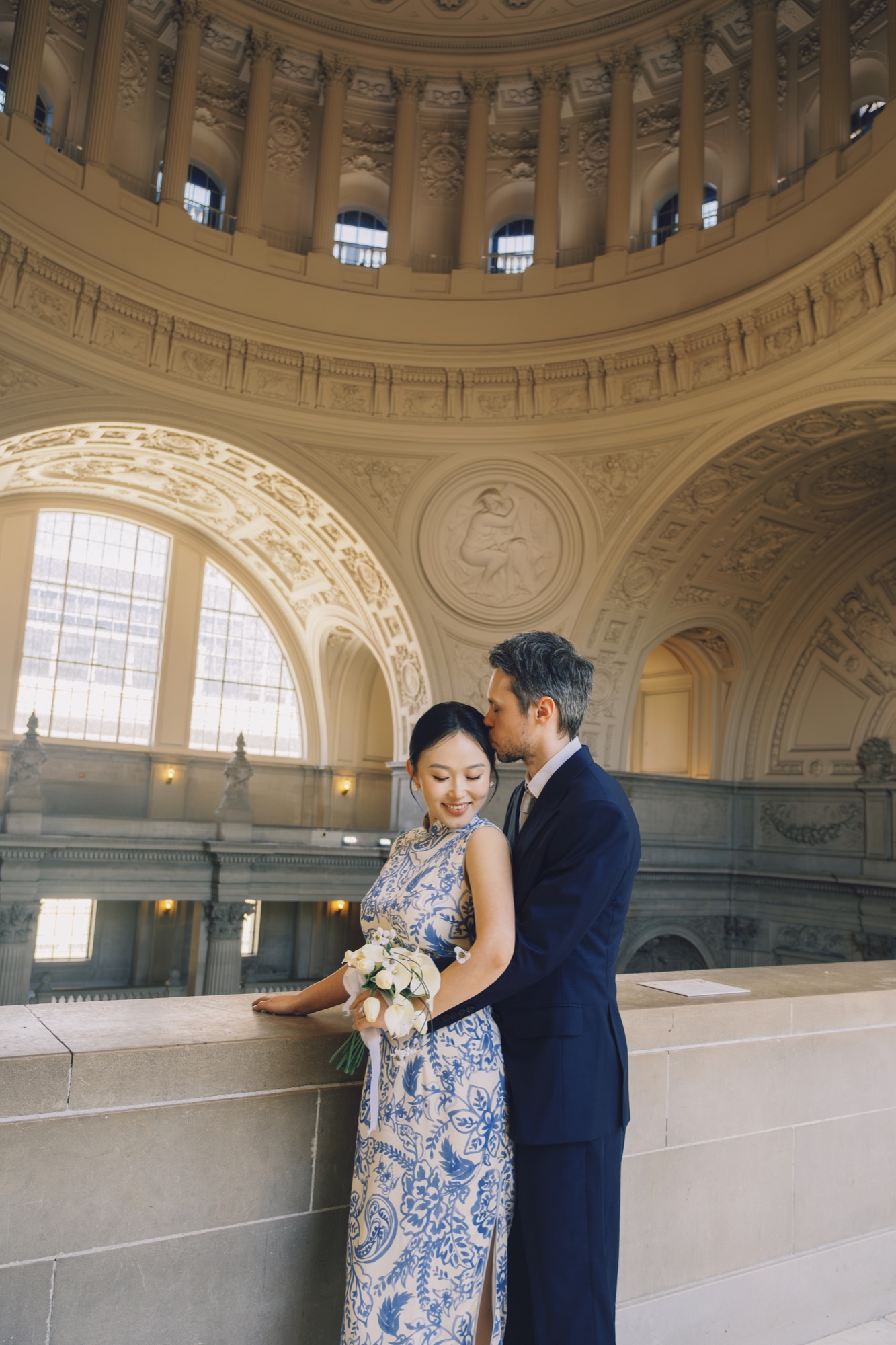 The couple beneath the City Hall rotunda