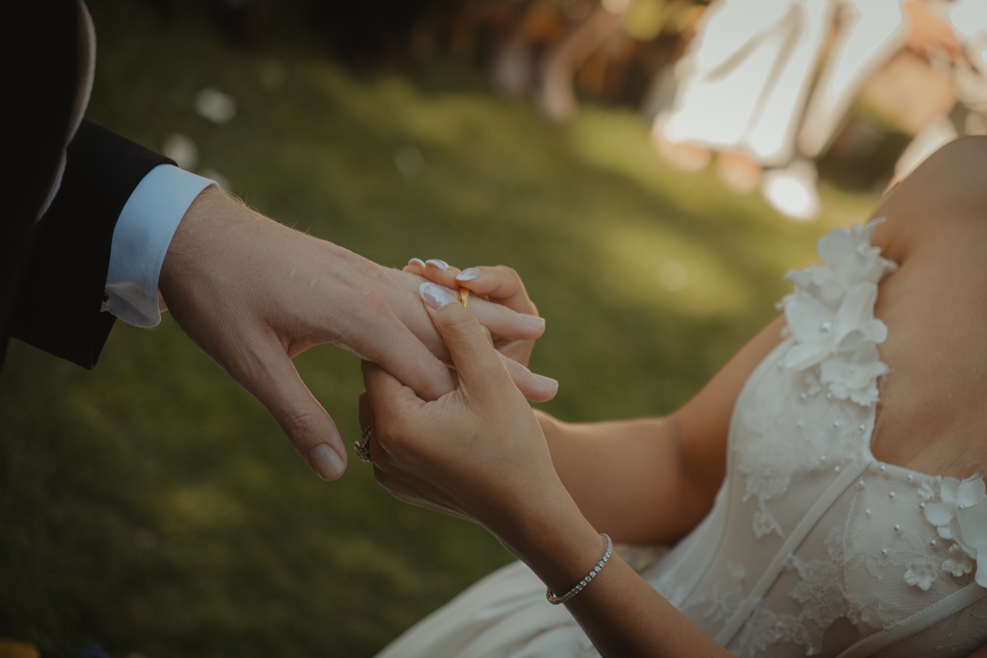 Nicole and Tanner holding hands after the ceremony